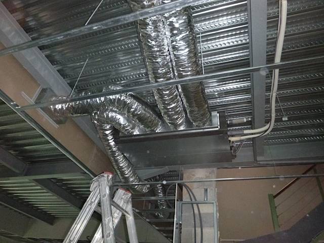 Installation de Climatisation Réversible Gainable pour un Projet de Rénovation à la Zone de la Valentin